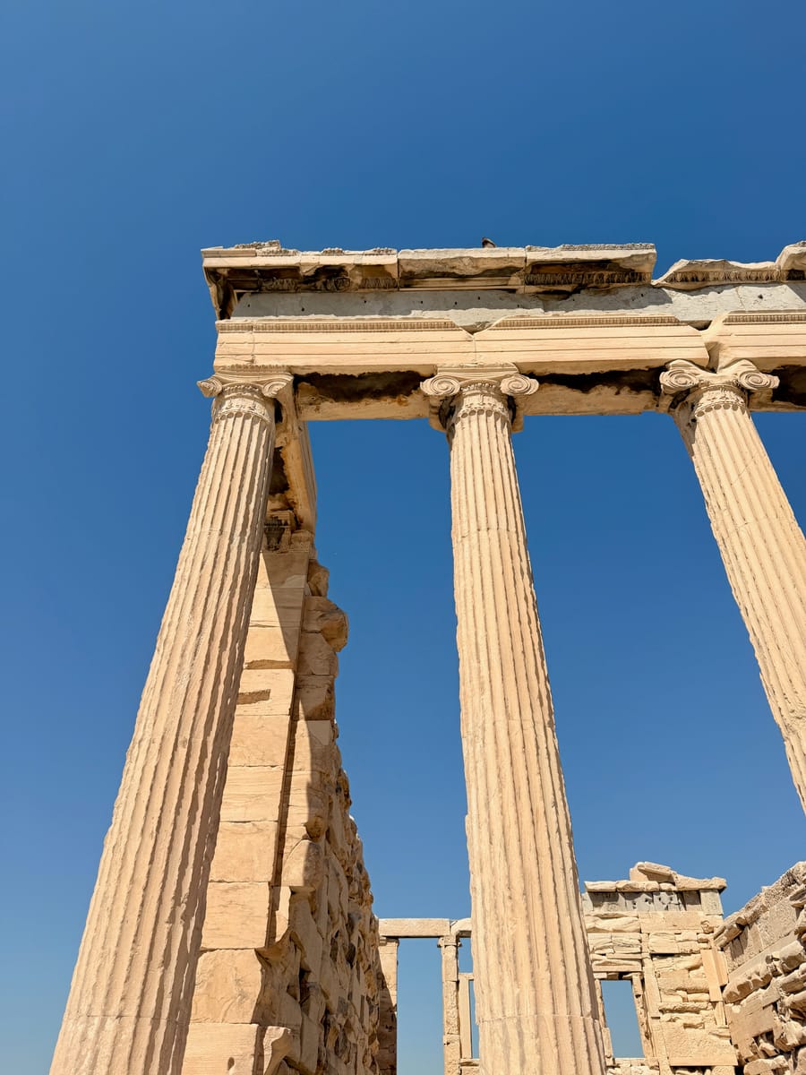 Looking up a row of fluted columns